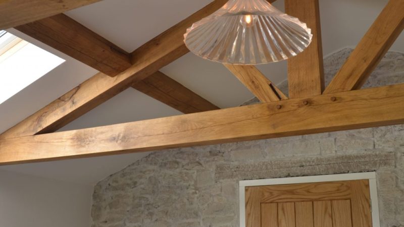 photo of beams and ceiling showing new door